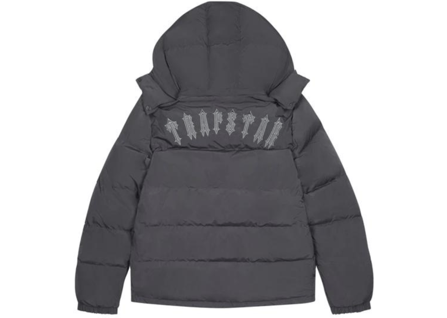 A stylish streetwear outfit featuring a Trapstar jacket paired with slim denim, classic sneakers or combat boots, and accessories like a beanie and crossbody bag, illustrating how to wear and style the jacket with clean layering.