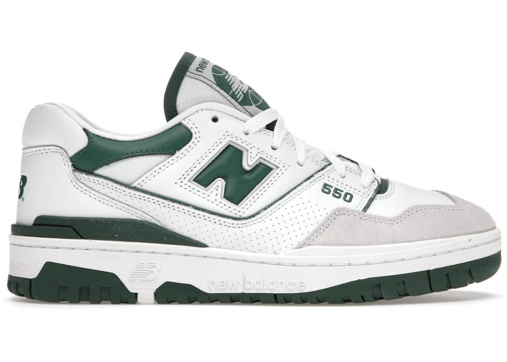 new balance 550 sneakers in white with green detail